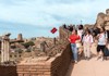 A group of tourists walking down the Palatine Hill with their guide from The Tour Guy.