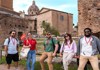 A group of tourists in front of the Senate in the Roman Forum with their guide from The Tour Guy.