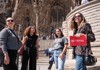 A group of tourists infront of the Sagrada Familia with their guide from The Tour Guy.