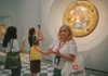 Two women taking a picture of the Tondo Doni while on tour with The Tour Guy.