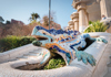 Two women sitting on a bench at Park Guell in Barcelona
