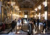 A picture of 2 tourists takinga selfie inside of the Great Gallery Room  of Palazzo Colonna on a tour with The Tour Guy. 