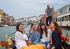 A group of tourists on a gondola ride while taking a tour with The Tour Guy