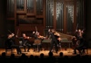 Interpreti Veneziani playing instruments on a stage