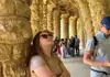 A woman looking at Bridges in Park Guell in Barcelona