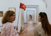 Tour guide chatting with guest in the Vatican Museums