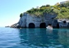   A boat on a cliff with a cave in Ponza waters