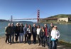 Group with Golden Gate Bridge in background
