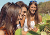 people smiling in vineyard