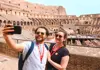 A couple taking a selfie from the 2nd level of the Colosseum while on tour with The Tour Guy.