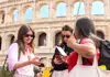 A pair of tourists checking in to their tour with The Tour Guy.