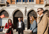 A group of tourists in front of Despar Teatro Italia with a guide from The Tour Guy.