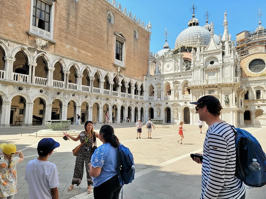 people taking photos in courtyard