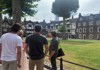 A group of tourists inside the Tower of London with their guide from The Tour Guy.