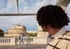 Man looking at Castel Sant'Angelo on a Tuk Tuk
