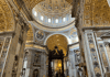 A picture of Bernini's monument to Pope Alexander inside of St. Peter's Basilica in Italy. 