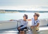 girl and guide on boat